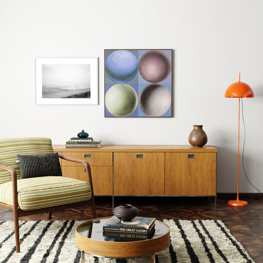 Geometric art print with spheres in an eclectic living room.