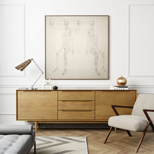 Monochrome anatomy art print with seated figures, in an elegant and modern interior.
