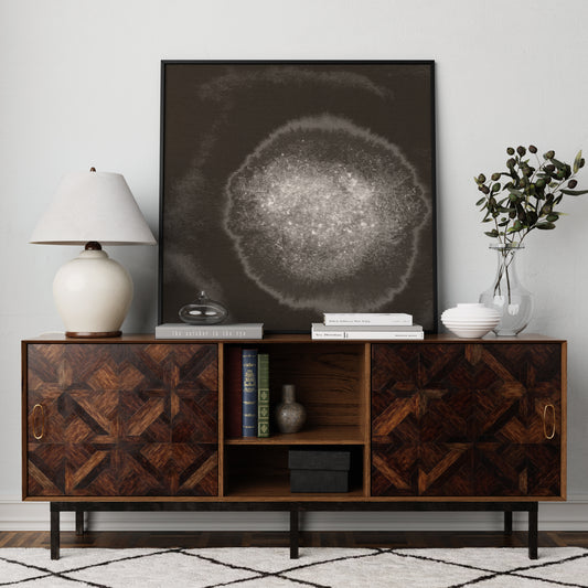 Abstract black and white art print in a calm interior.