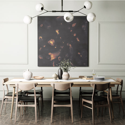 Dark abstract art print in a moody dining room.