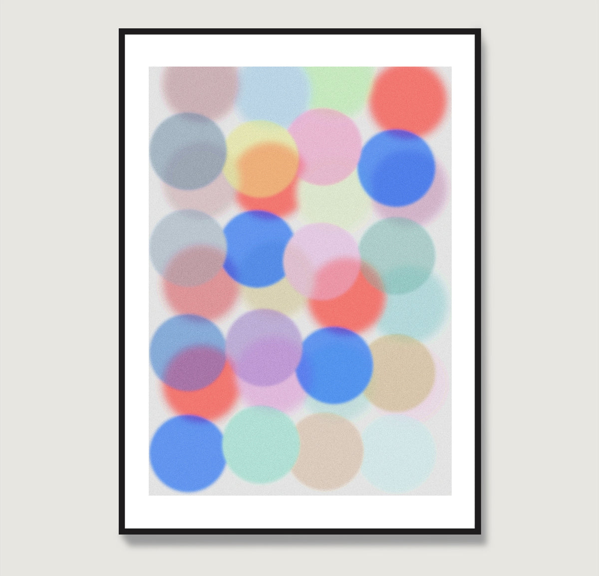 Framed artwork with colorful dots on a light background