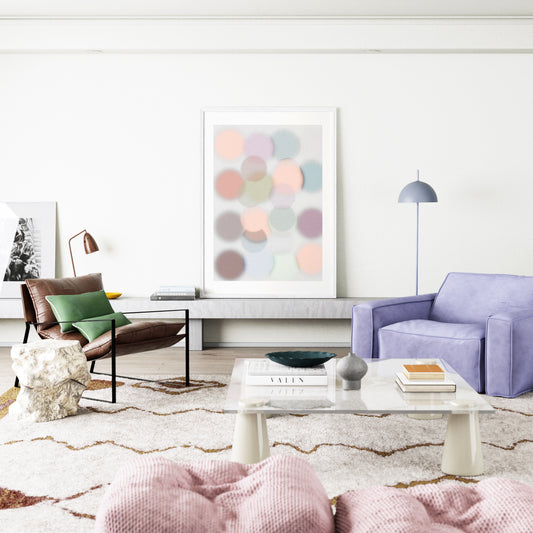 Modern living room with a purple armchair, brown leather chair, and abstract art on the wall.