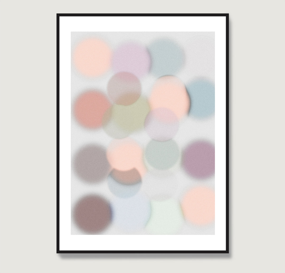 Framed abstract art print with pastel-colored circles on a light gray background.