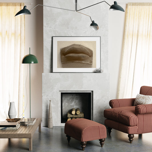 Michelangelo David's mouth, anatomy monochrome art print above the fireplace in an eclectic interior.