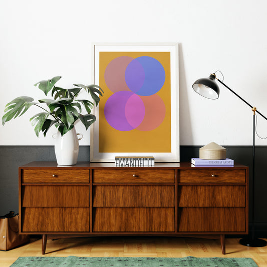 Colorful geometric graphic art print in a vintage interior.