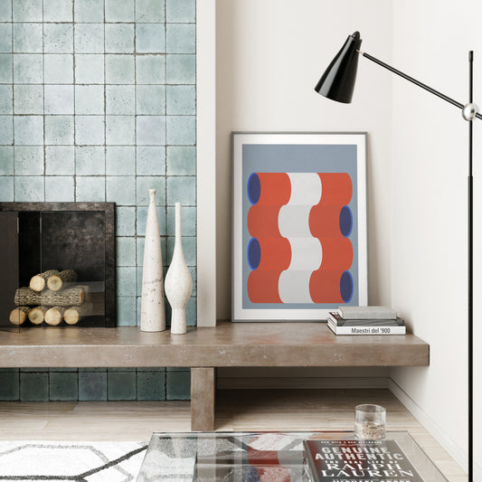 Blue, white and red graphic art print in a mid-century modern interior.