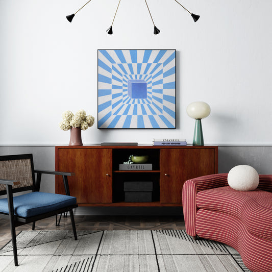 Modern living room with a wooden cabinet, abstract artwork, and decorative items.