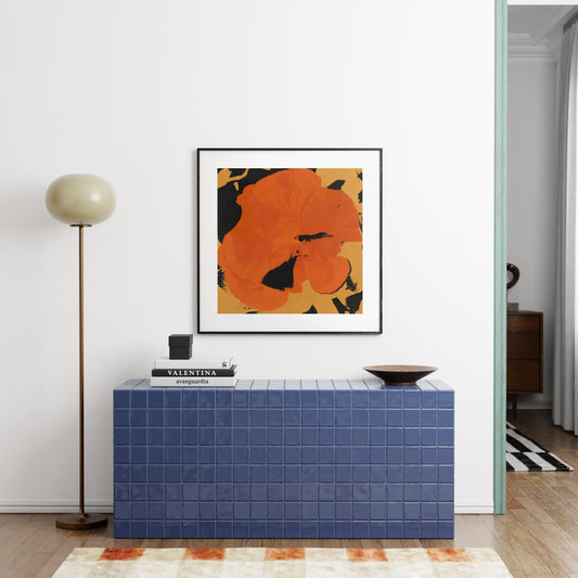 Pop art print above a sideboard in a modern interior.
