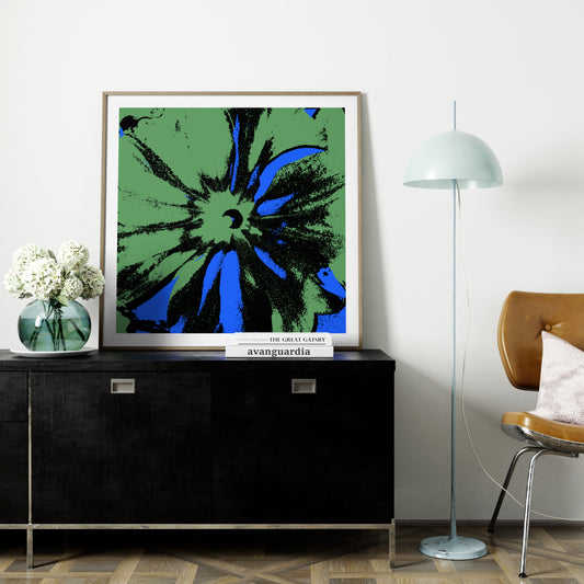 Blue and green flower pop art art print on a black sideboard.