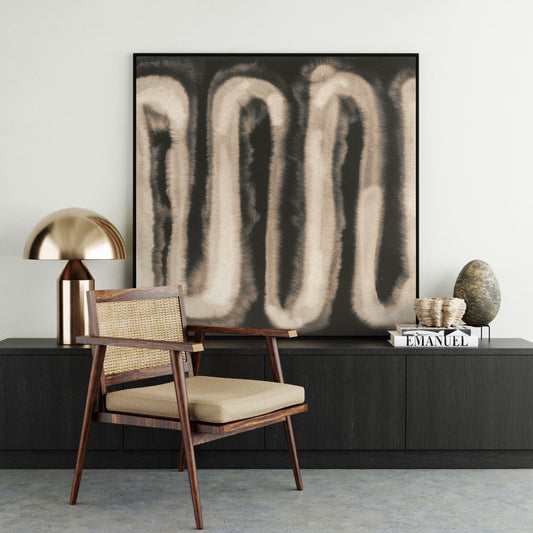 Monochrome watercolor abstract art print in a minimalist interior.