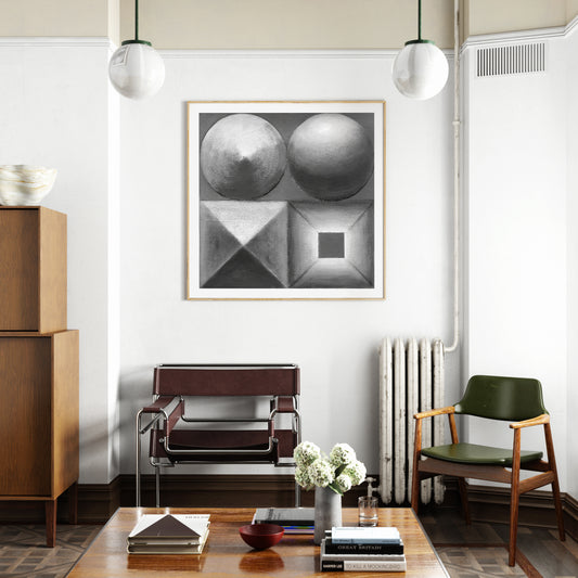 Black and white abstract geometric art print in a vintage style interior.