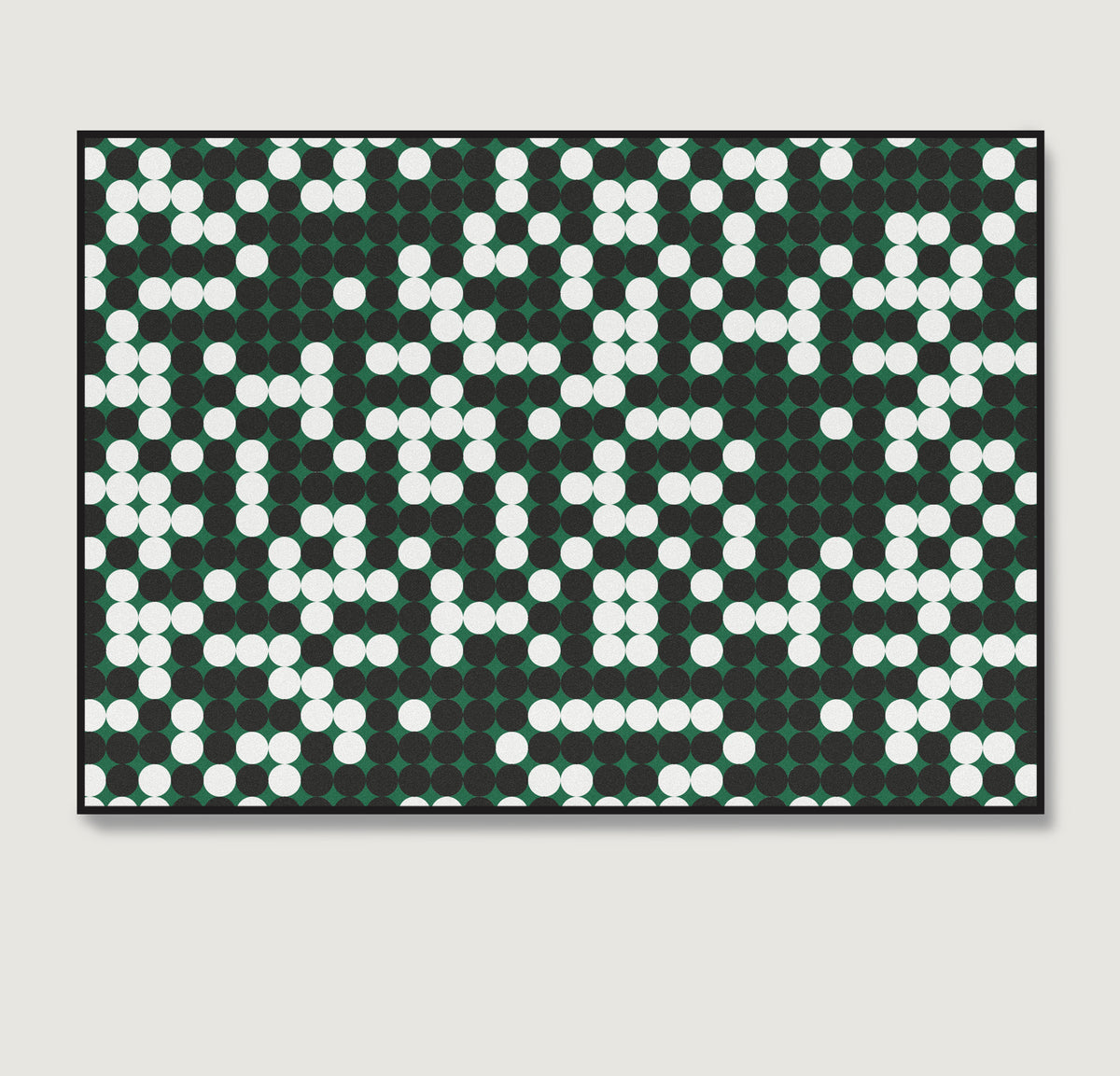 Patterned design art print with white and black dots on a green background.