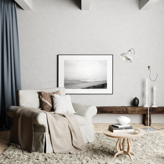 Moody Lake Garda black and white photography art print in a cozy interior.