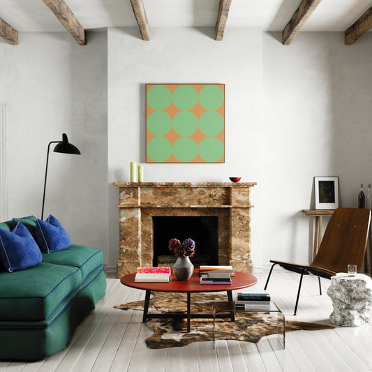 Green dots on a orange background, minimalist graphic art print, in an eclectic living room.