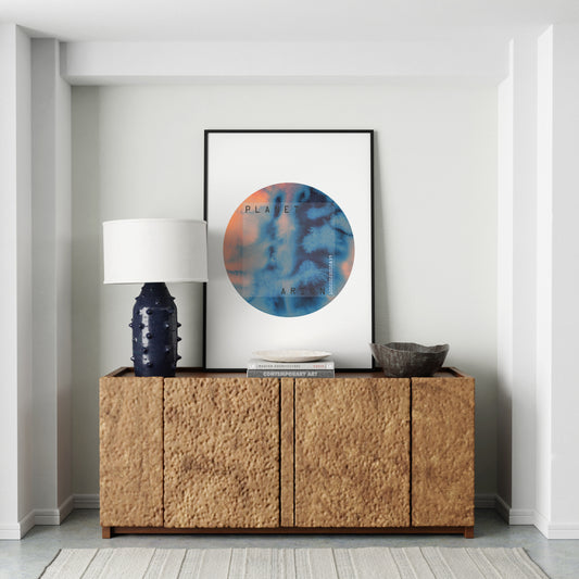 Blue and orange planet, minimalist watercolor graphic art print, in a modern interior.