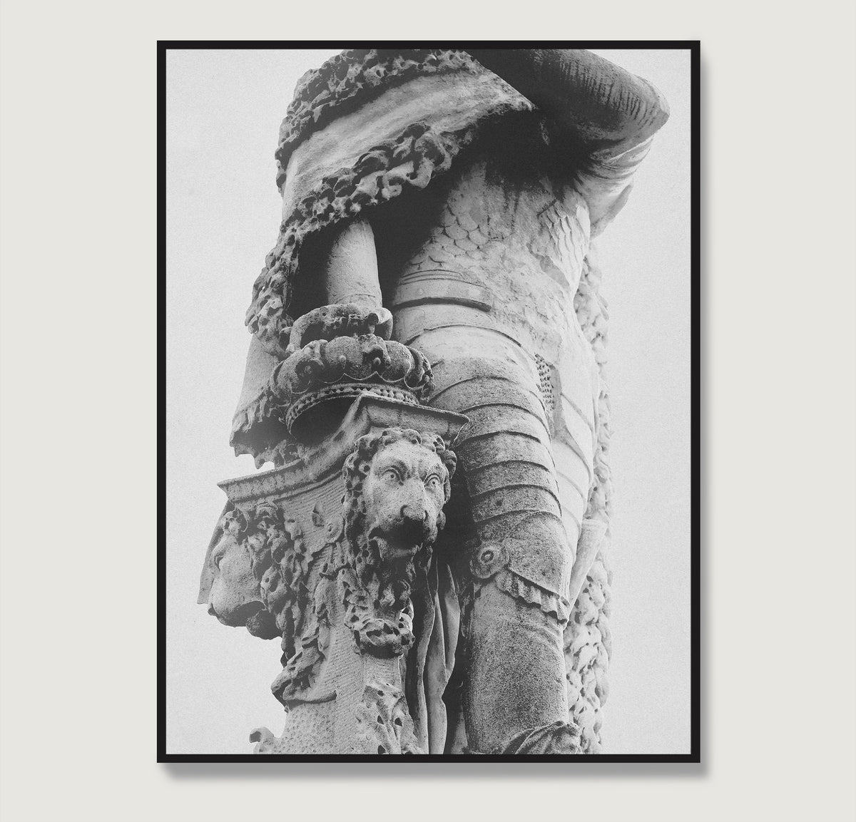 Framed black and white photograph art print of a detailed stone sculpture with a lion's head.