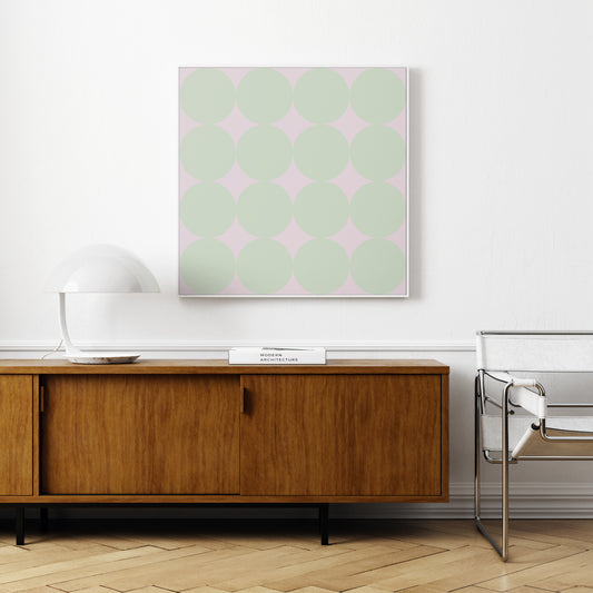 Green dots on a pink background, minimalist contemporary art print, in a parisian apartment.