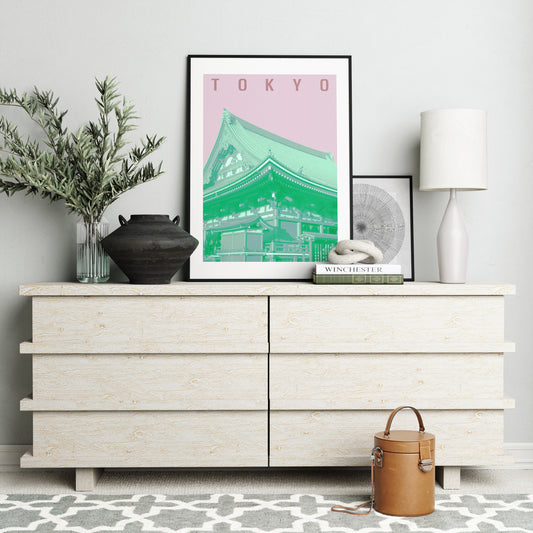 Travel poster Tokyo landmark, green and pink art print in a white interior.