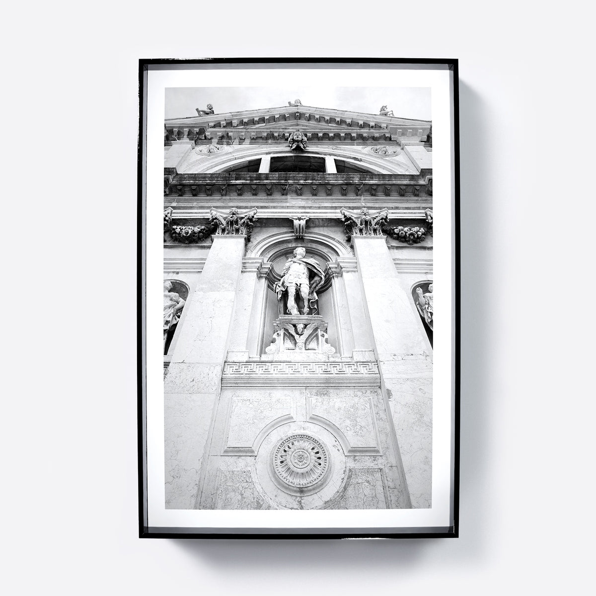 Black and white photography art print of a church facade in Venice.