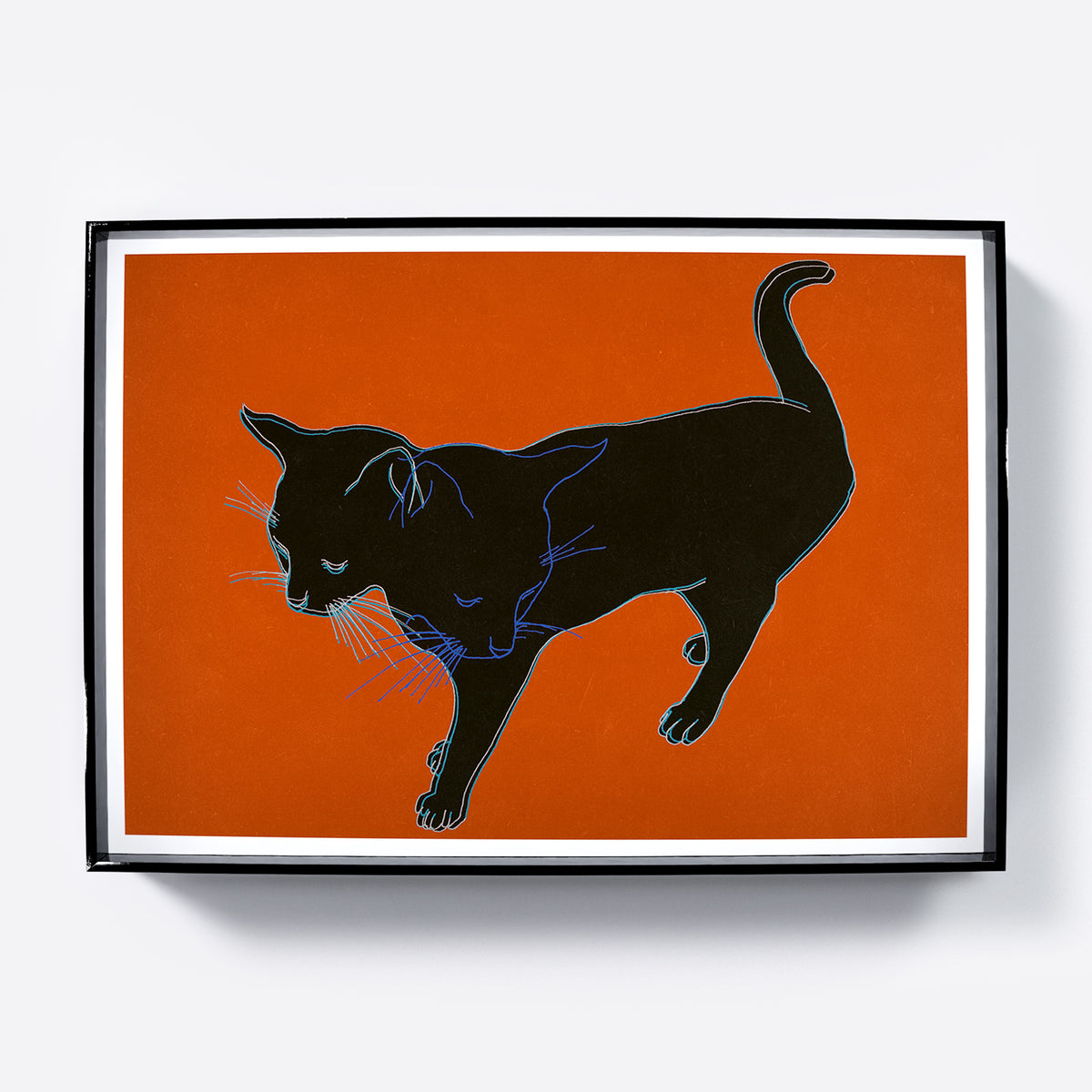 Art print with a black cat on an orange background.