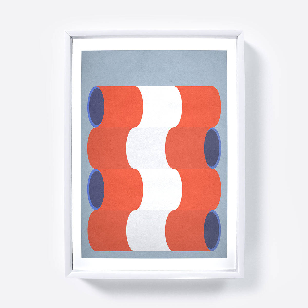 Framed abstract art print with red, white, and blue shapes on a light blue background.