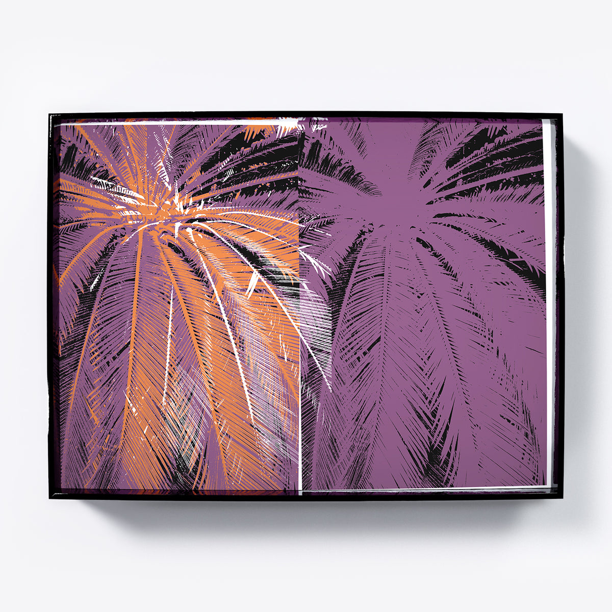 Framed artwork with palm tree design on a purple background