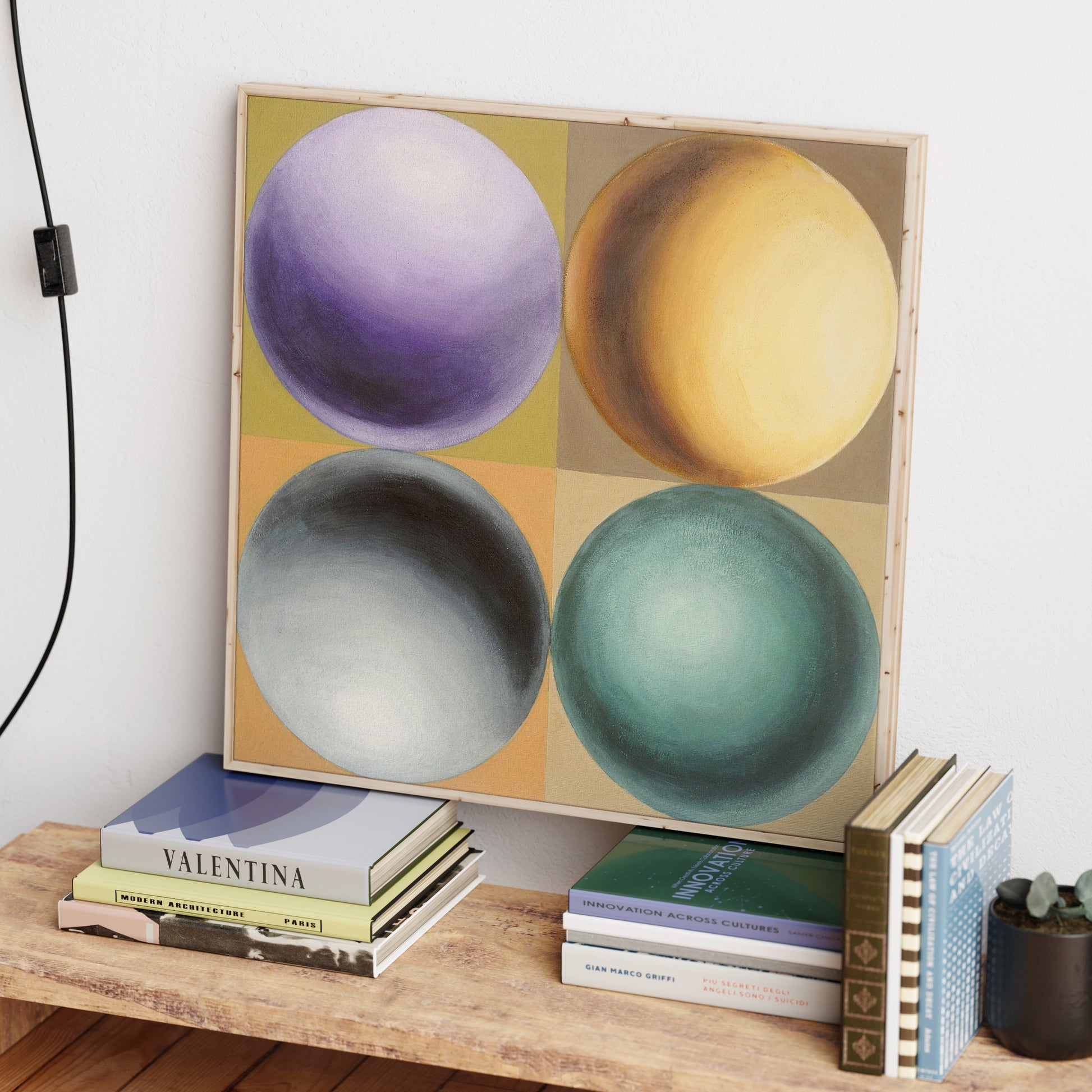 Colorful geometric canvas art print with spheres.