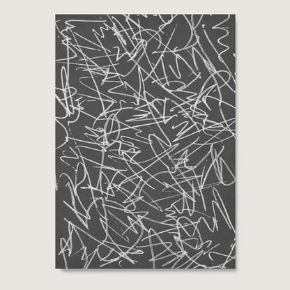 Black and white abstract art print on paper.