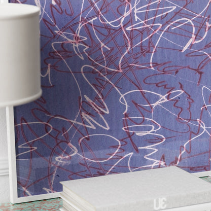 Detail of a purple abstract art print with white lines.