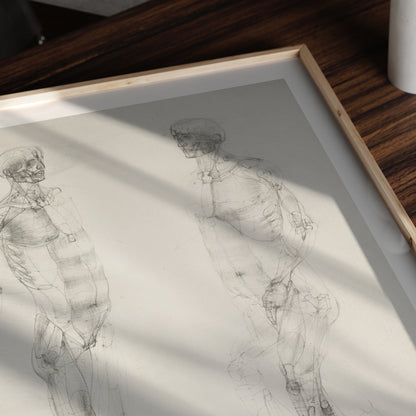 Detail of a monochrome human body anatomy art print in a moody space.