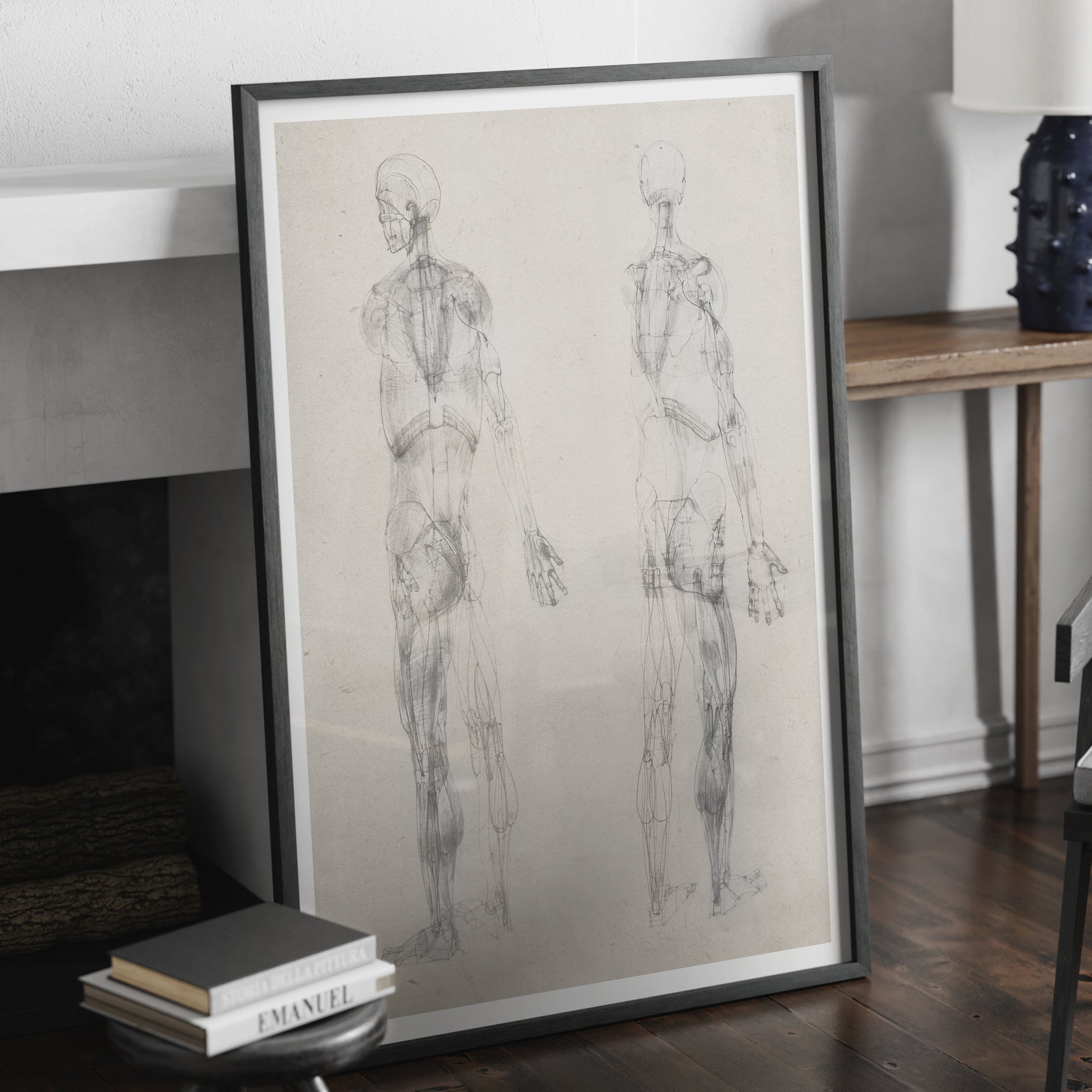 Monochrome human body anatomy art print with two standing figures.