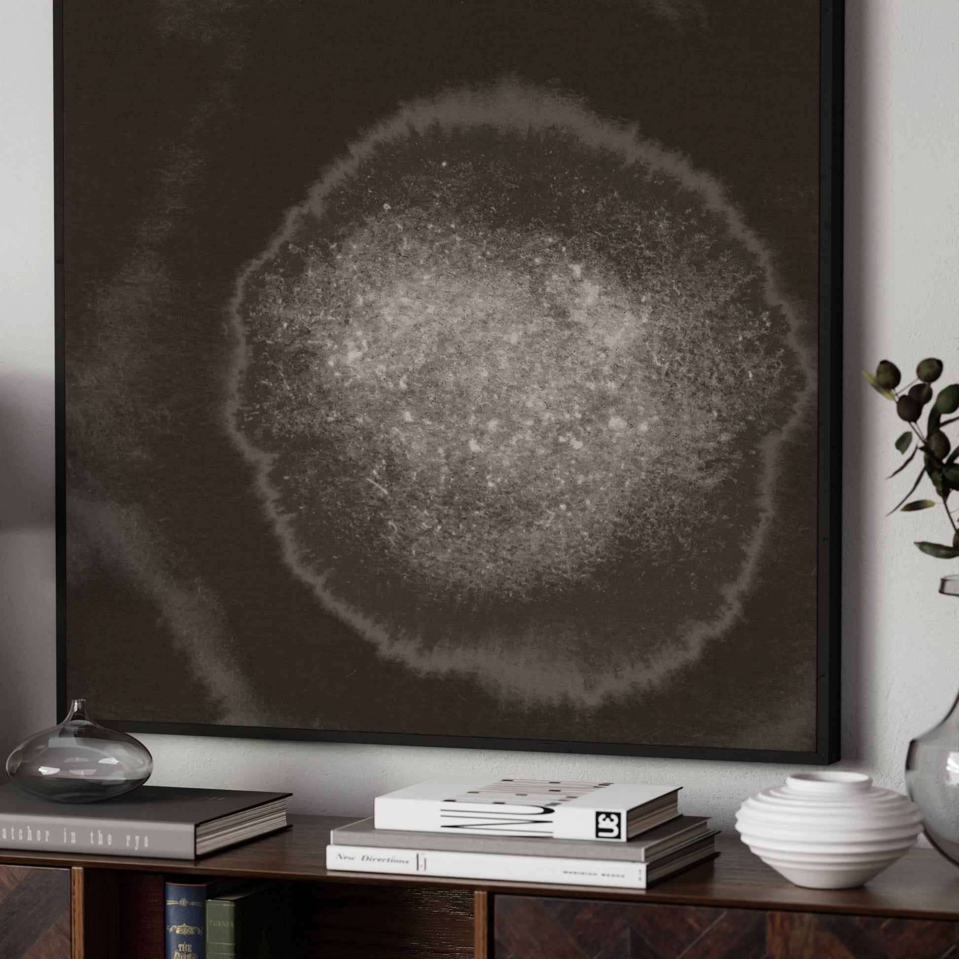 Abstract black and white art print on canvas on a wall.