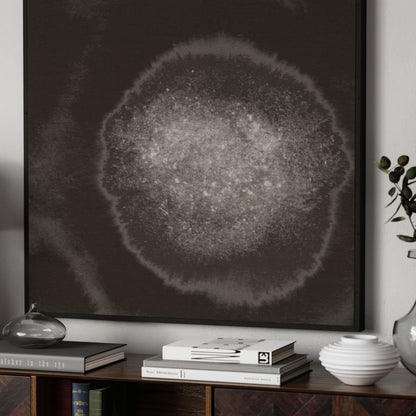 Abstract black and white art print on canvas on a wall.