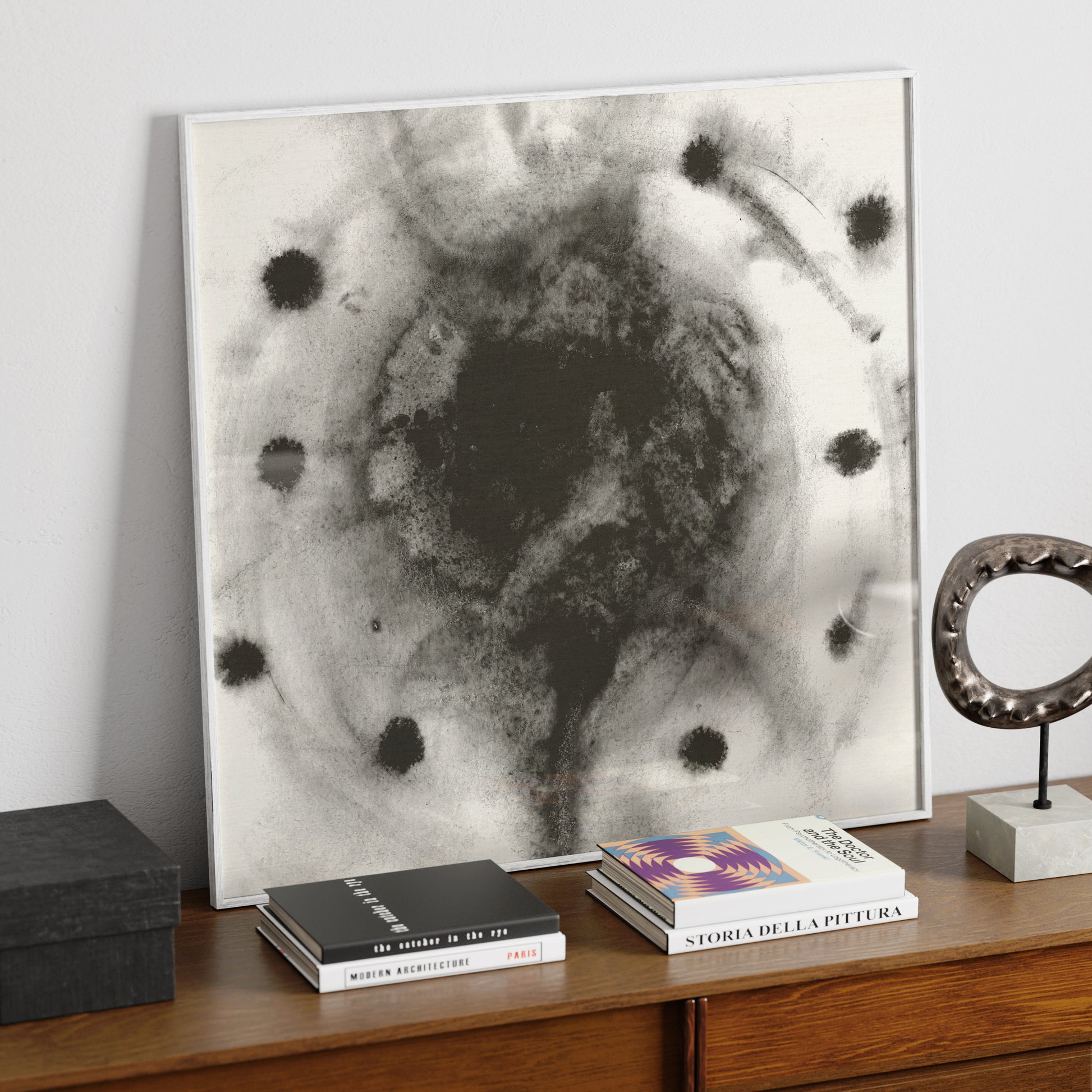 Abstract black and white art print in watercolor technique in a sophisticated interior.