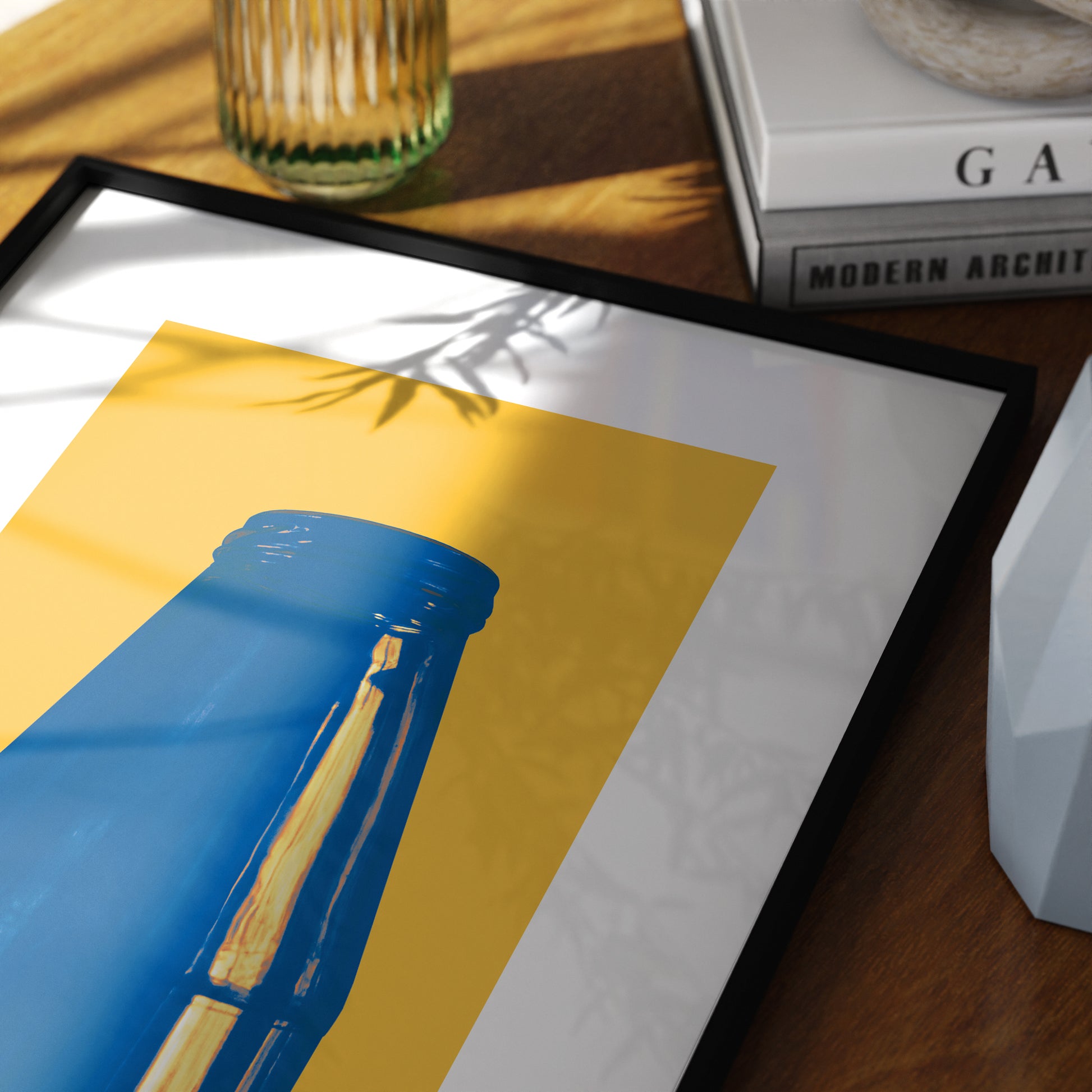 Minimalist graphic art print with blue and yellow in a moody space.