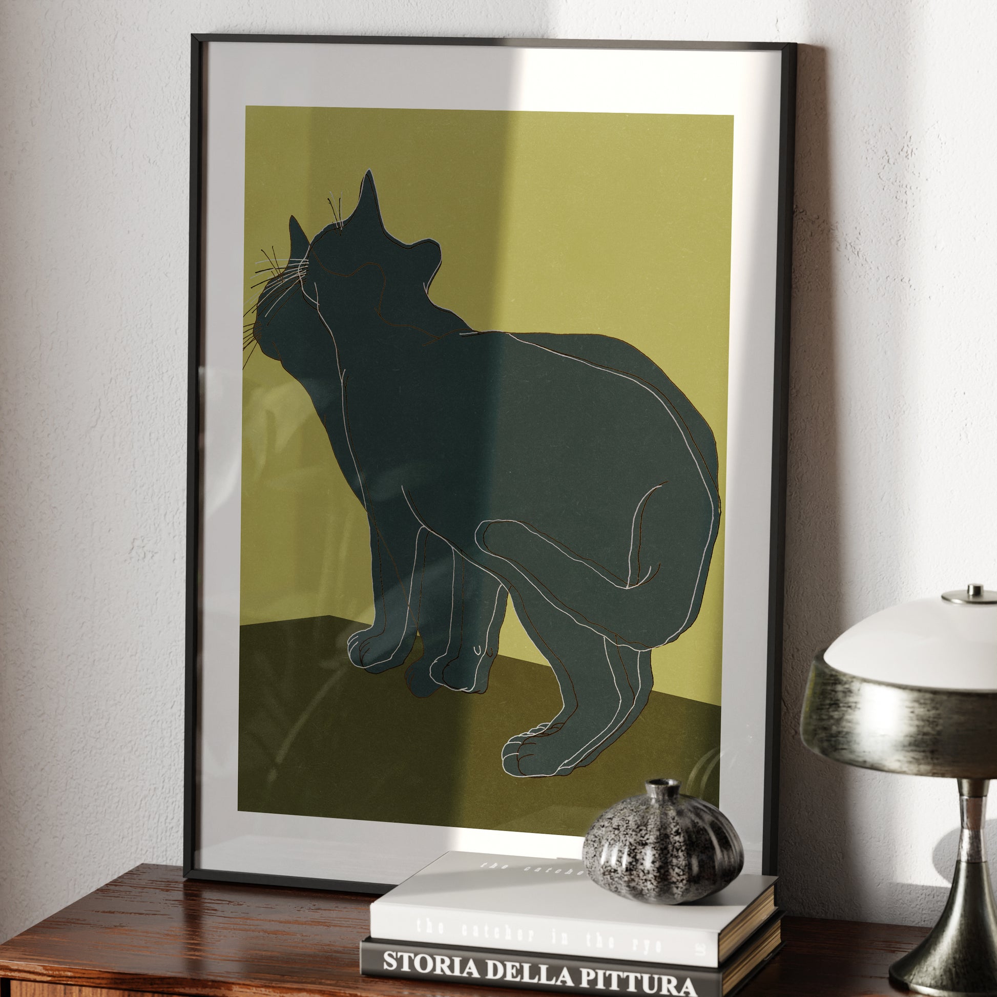 Art print with a cat on a sideboard.