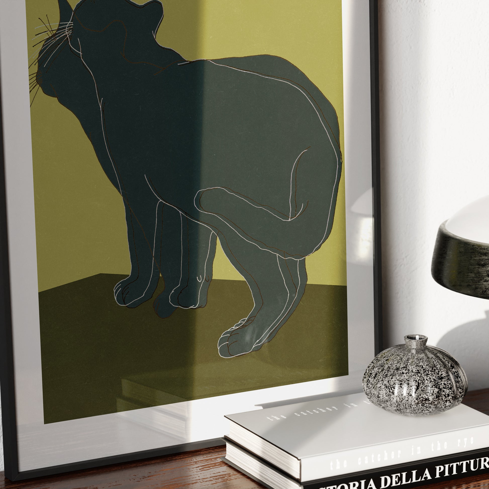Detail of an art print with a cat.