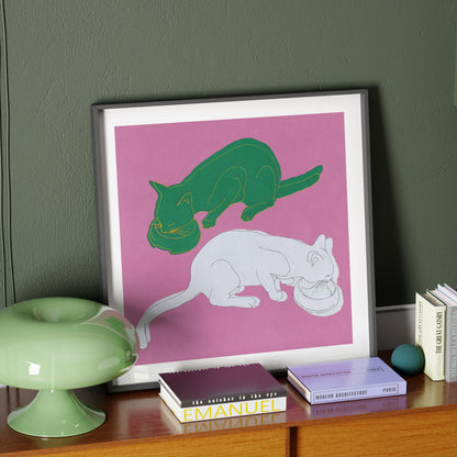 Framed art print with two cats on a pink background.