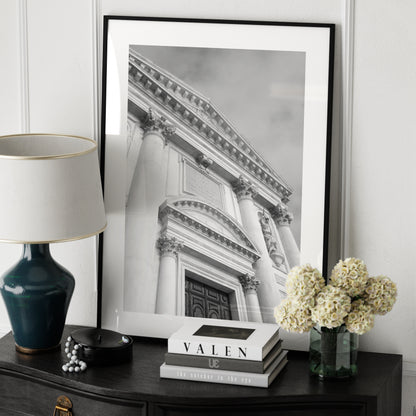 Classic facade of a Venetian church, black and white architectural photography art print on a sideboard.