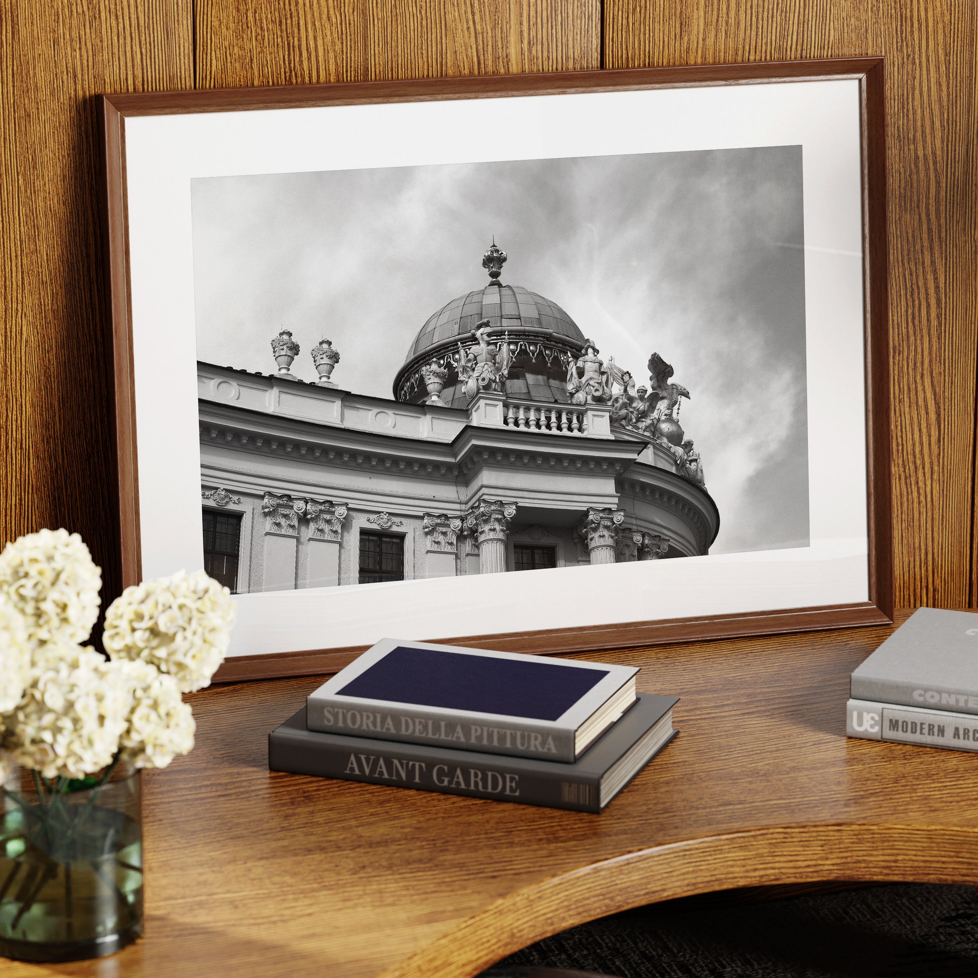 Classic Vienna architectural corner, black and white photography art print on a wood table.
