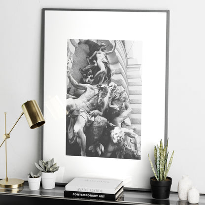 Baroque sculptures black and white photography art print in a dark, metallic frame.