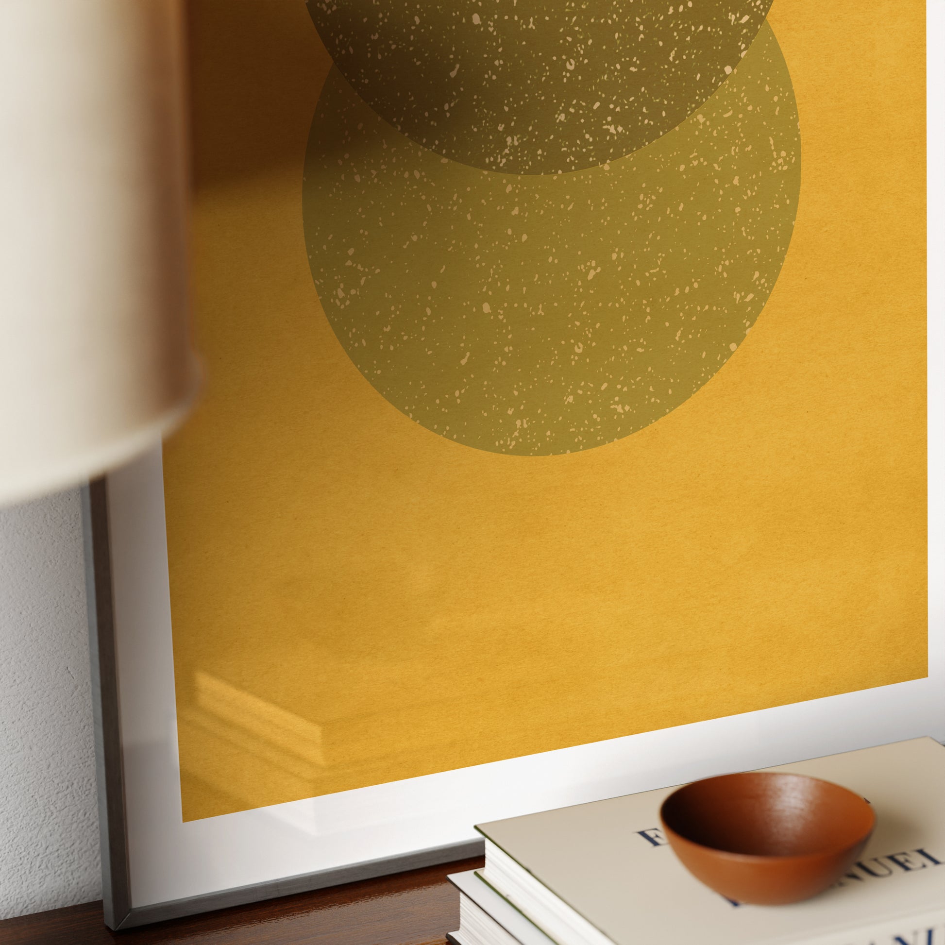 Detail of a yellow geometric abstract art print.