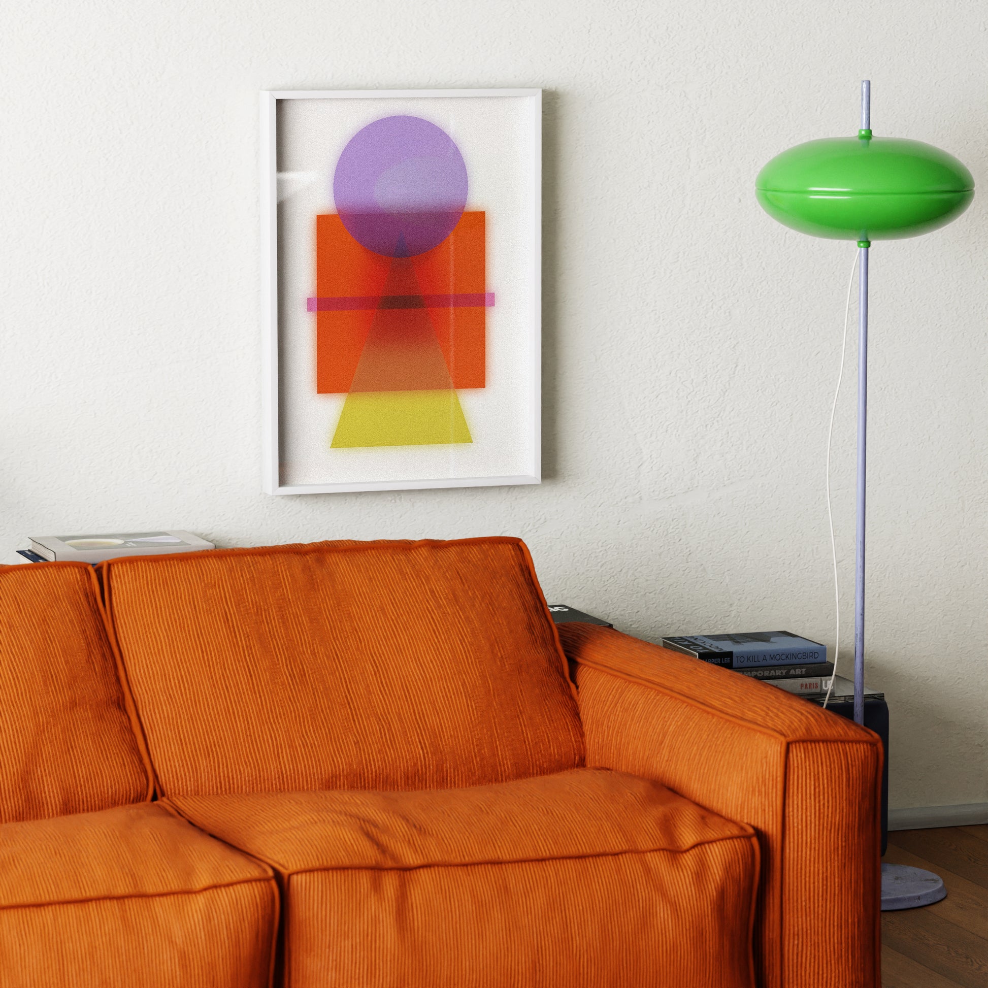 Orange sofa with a green floor lamp and abstract art on a white wall.