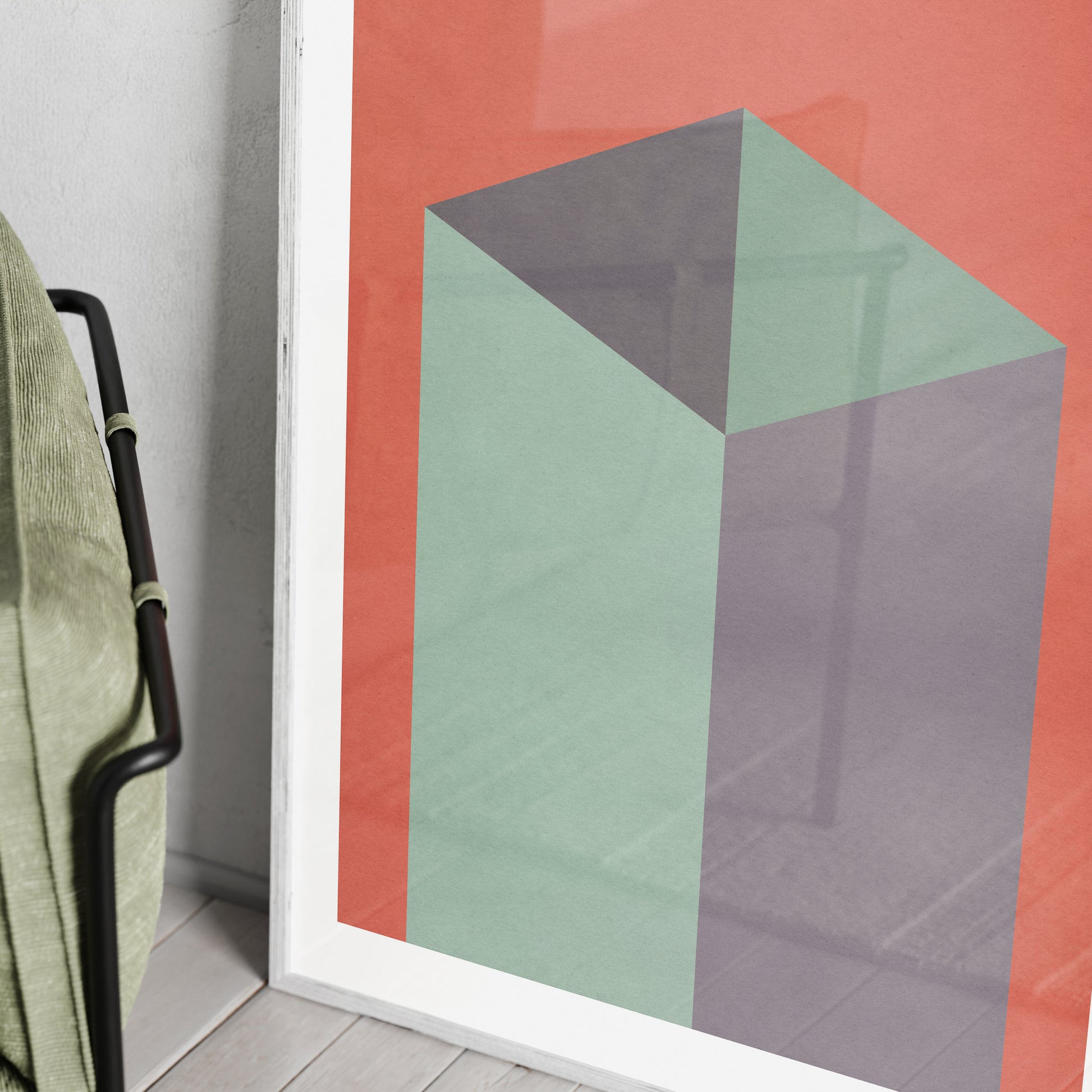 Detail of a red and green geometric graphic art print.