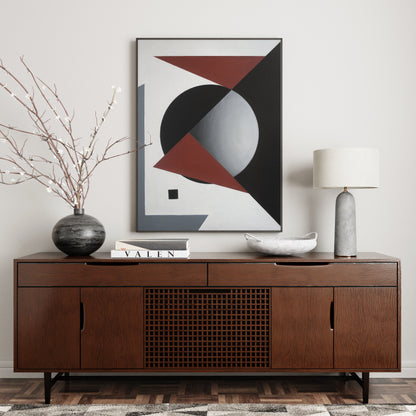Suprematism painting with red, black and white, above a stylish sideboard.