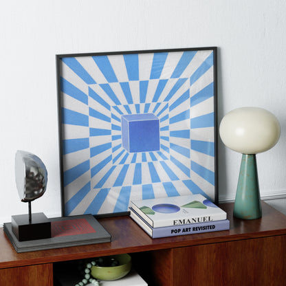 Framed abstract artwork with blue and white stripes on a wooden shelf with decorative items.