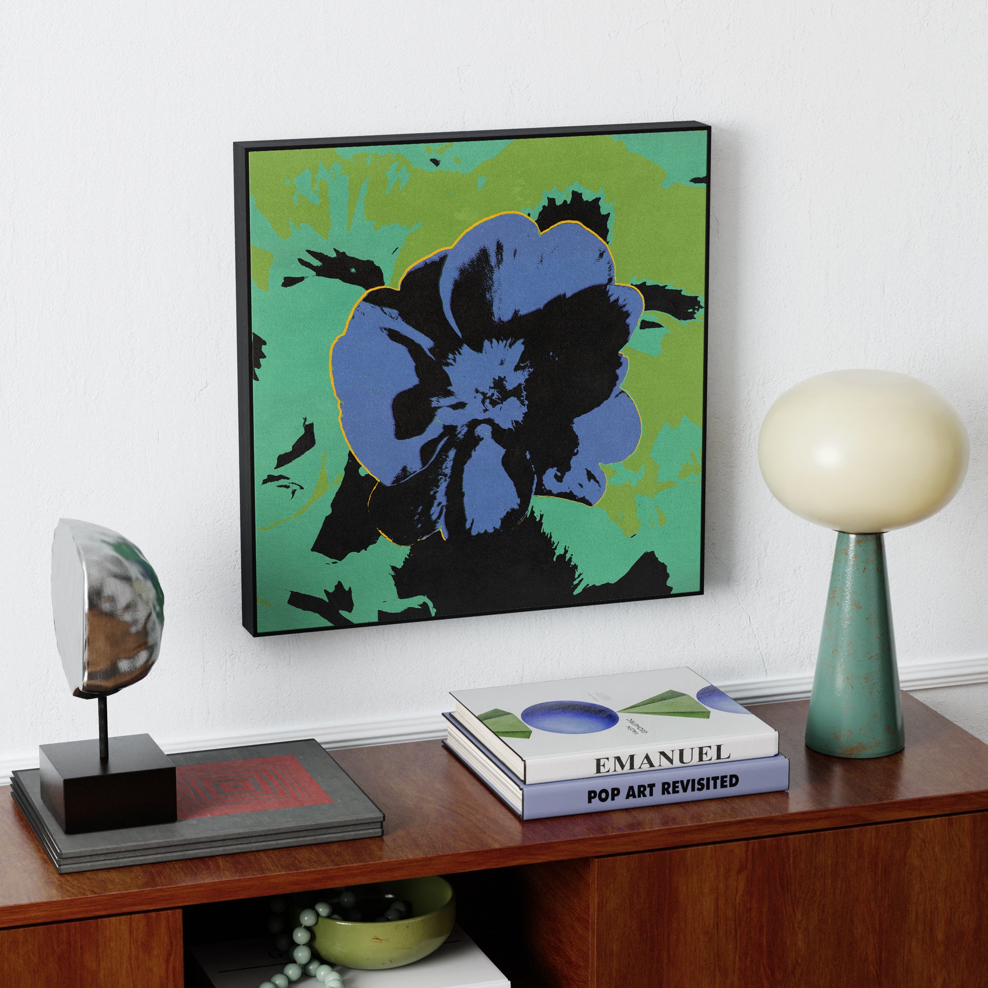 Pop art canvas print with flower, above a sideboard. 