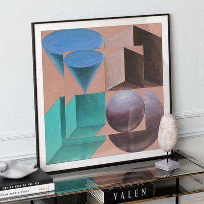 Colorful artistic geometric art print on a modern glass sideboard.