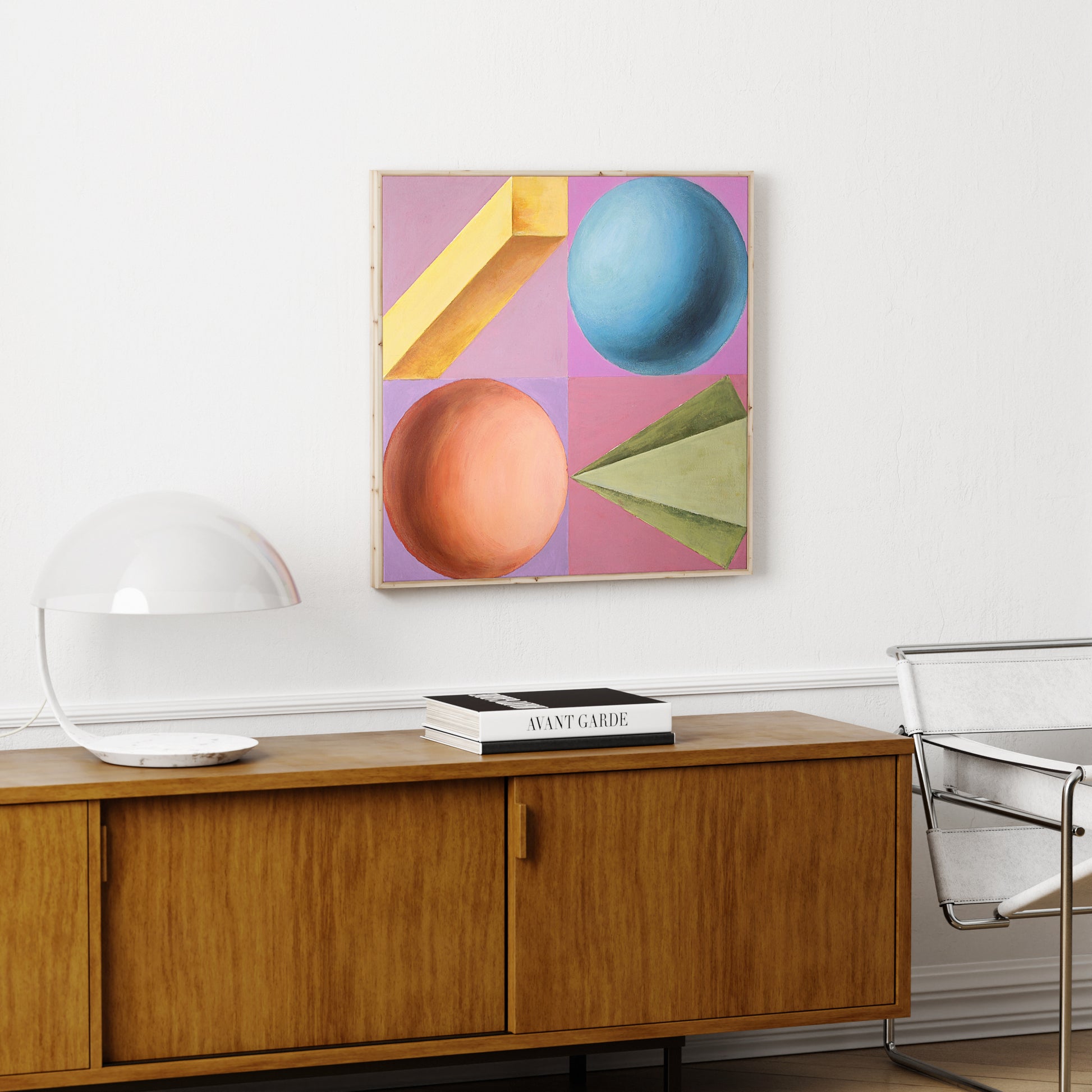 Intense colors playful and colorful geometric art print, above a wood sideboard.