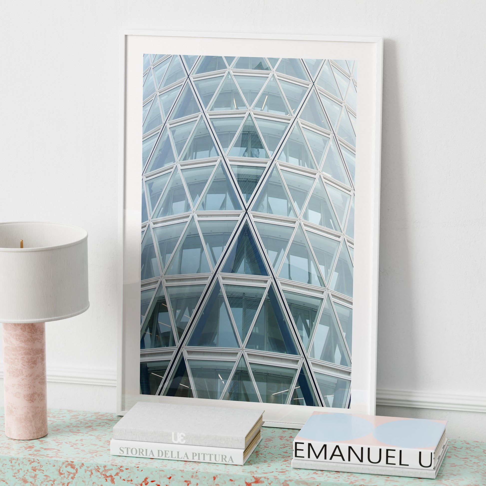 Abstract, geometric, modern architectural corner of Milan, pale blue photography art print in a white frame.